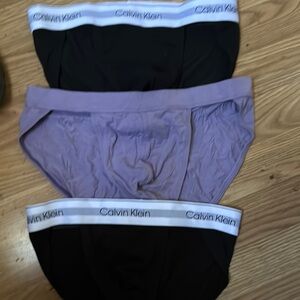 Calvin Klein Black briefs with purple brief